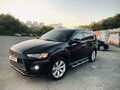 2009 Mitsubishi Outlander II Рестайлинг, чёрный, 1550000 рублей - вид 7