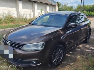 2012 Volkswagen Jetta VI, коричневый, 850000 рублей, вид 1