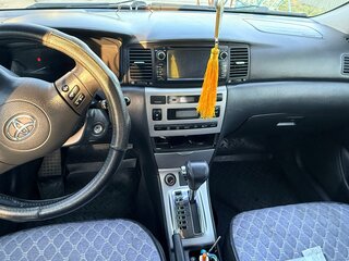 2006 Toyota Corolla IX (E120, E130) Рестайлинг, голубой, 700000 рублей, вид 4