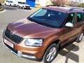 2014 Skoda Yeti I Рестайлинг, коричневый, 950000 рублей - вид 1