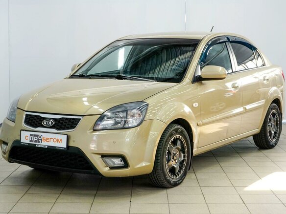 2009 Kia Rio II Рестайлинг, бежевый - вид 6