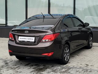 2016 Hyundai Solaris I Рестайлинг, коричневый, 919000 рублей, вид 5