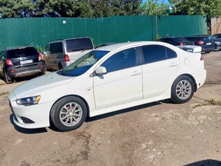 2011 Mitsubishi Lancer X Рестайлинг, белый, 720000 рублей, вид 4