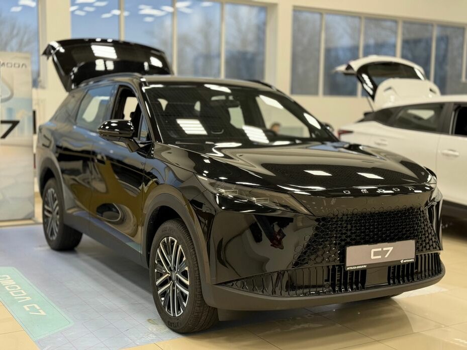 Открыть фотографии: Omoda C7