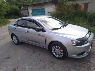 2012 Mitsubishi Lancer X Рестайлинг, серебристый, 730000 рублей, вид 1
