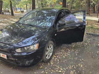 2010 Mitsubishi Lancer X, чёрный, 900000 рублей, вид 2