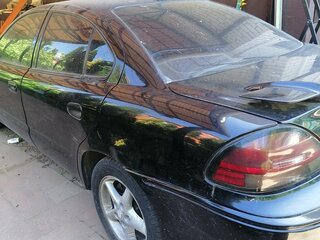 1999 Pontiac Grand AM V, чёрный, 450000 рублей, вид 2