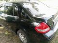 2008 Nissan Tiida I, чёрный, 550000 рублей - вид 6