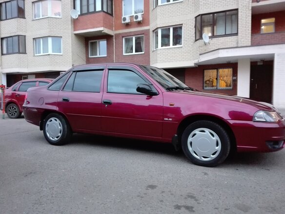 2009 Daewoo Nexia I Рестайлинг, красный - вид 3