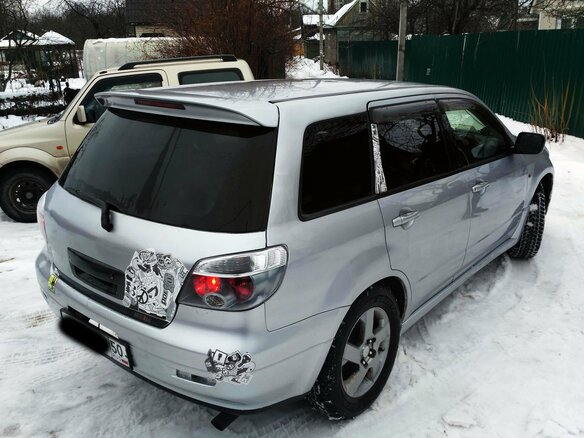 2003 Mitsubishi Airtrek I, серебристый - вид 11