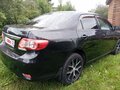 2010 Toyota Corolla X (E140, E150) Рестайлинг, чёрный, 1100000 рублей - вид 9