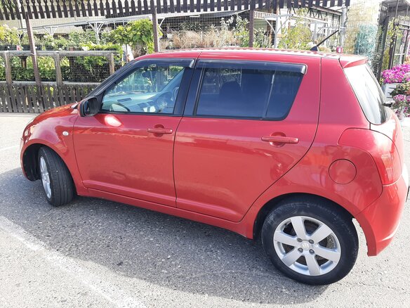 2004 Suzuki Swift III, пурпурный - вид 2