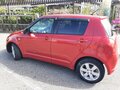 2004 Suzuki Swift III, пурпурный - вид 2
