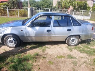 2012 Daewoo Nexia I Рестайлинг, серебристый, 280000 рублей, вид 3