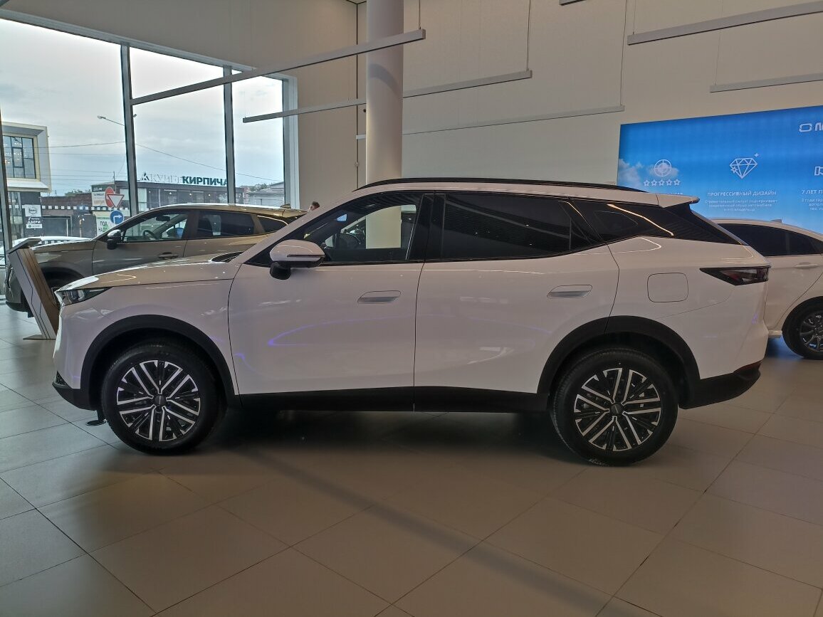 Открыть фотографии: Omoda C7