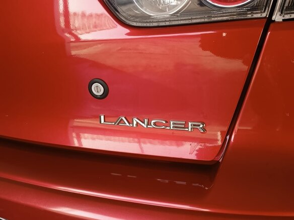 2010 Mitsubishi Lancer X, красный, 650000 рублей - вид 3