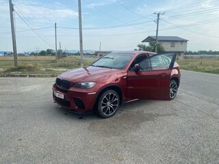 2009 BMW X6 50i 6-speed I (E71), красный, 2000000 рублей, вид 1