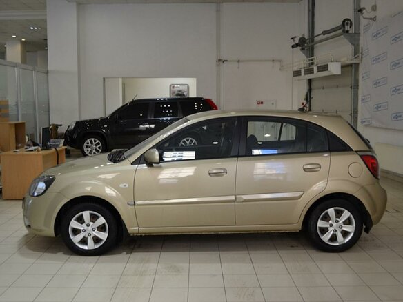 2010 Kia Rio II Рестайлинг, бежевый - вид 5