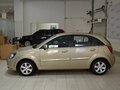 2010 Kia Rio II Рестайлинг, бежевый - вид 5