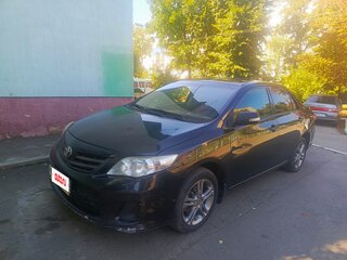 2010 Toyota Corolla X (E140, E150) Рестайлинг, чёрный, 700000 рублей, вид 1