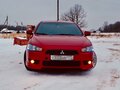 2007 Mitsubishi Lancer X, красный - вид 3