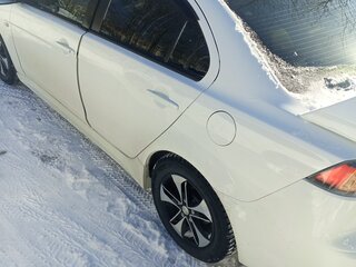 2012 Mitsubishi Lancer X Рестайлинг, белый, 750000 рублей, вид 2