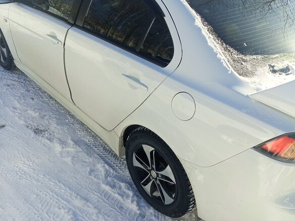 2012 Mitsubishi Lancer X Рестайлинг, белый, 750000 рублей - вид 1