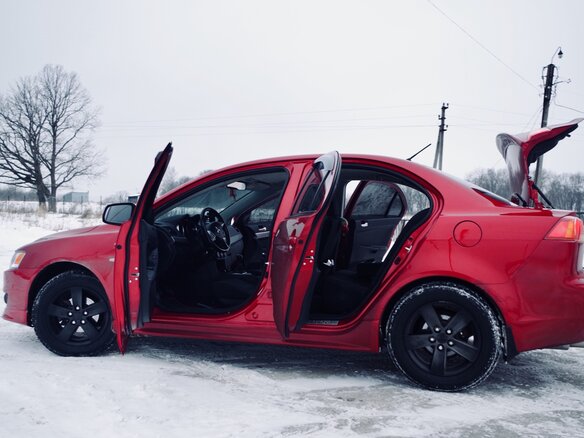 2007 Mitsubishi Lancer X, красный - вид 11