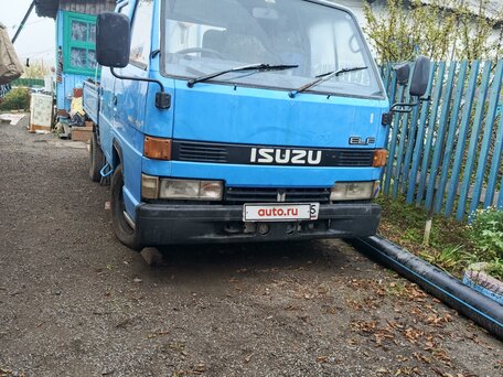 1987 Isuzu Elf (N-series), синий, 400000 рублей, вид 5