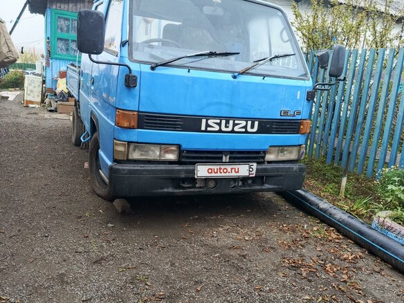 1987 Isuzu Elf (N-series), синий, 400000 рублей - вид 4