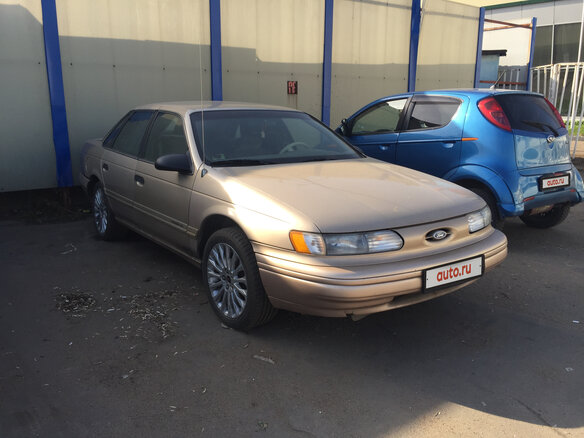 1993 Ford Taurus II, золотистый - вид 2