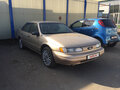 1993 Ford Taurus II, золотистый - вид 2