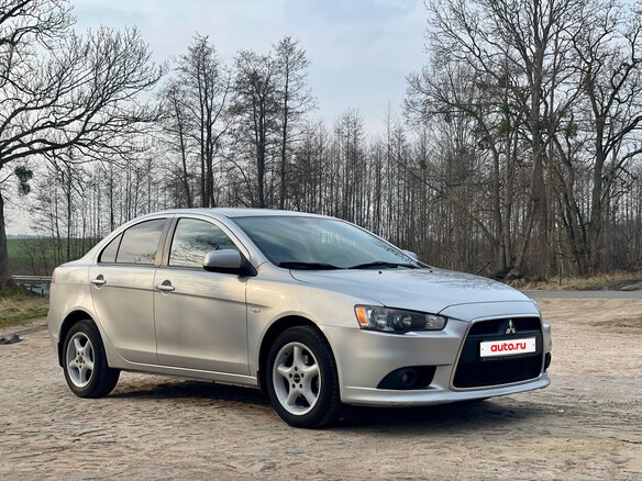 2011 Mitsubishi Lancer X Рестайлинг, серебристый, 805000 рублей - вид 2
