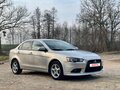 2011 Mitsubishi Lancer X Рестайлинг, серебристый, 805000 рублей - вид 2