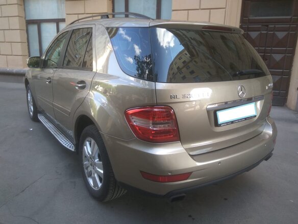 2009 Mercedes-Benz M-Класс 320 II (W164) Рестайлинг, бежевый - вид 4