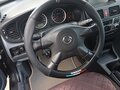 2006 Nissan Almera II (N16) Рестайлинг, чёрный, 400000 рублей - вид 4