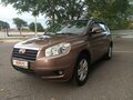 2013 Geely Emgrand X7 I, коричневый, 900000 рублей