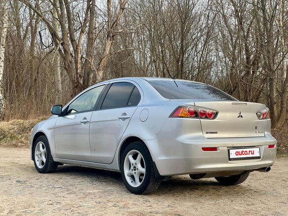 2011 Mitsubishi Lancer X Рестайлинг, серебристый, 805000 рублей - вид 5