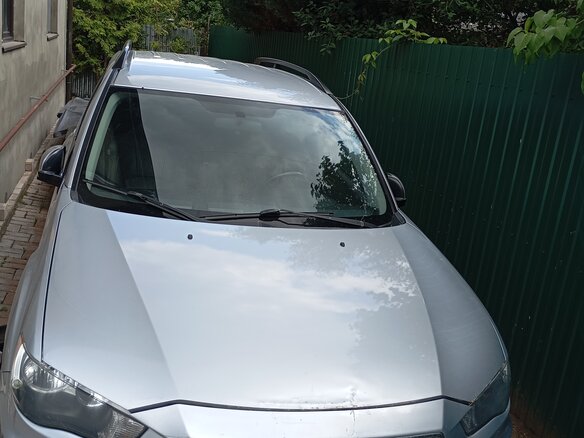 2011 Mitsubishi Outlander II Рестайлинг, серебристый, 905000 рублей - вид 1