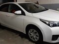 2014 Toyota Corolla XI (E160, E170, E180), белый, 1690000 рублей - вид 1
