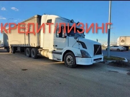 2004 Volvo VNL, белый, 2200000 рублей, вид 1