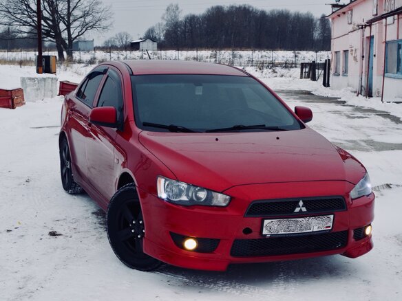 2007 Mitsubishi Lancer X, красный - вид 4