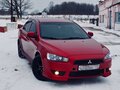 2007 Mitsubishi Lancer X, красный - вид 4