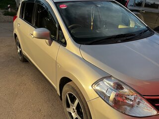 2012 Nissan Tiida I Рестайлинг, серебристый, 900000 рублей, вид 1