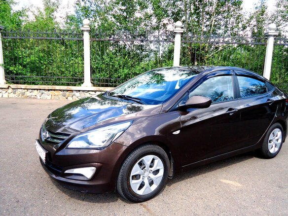 2016 Hyundai Solaris I Рестайлинг, коричневый, 945000 рублей - вид 3
