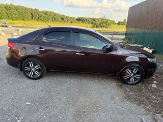 2011 Kia Cerato II, пурпурный, 910000 рублей, вид 2