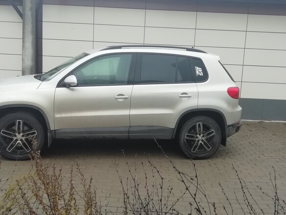 2011 Volkswagen Tiguan I Рестайлинг, золотистый - вид 1