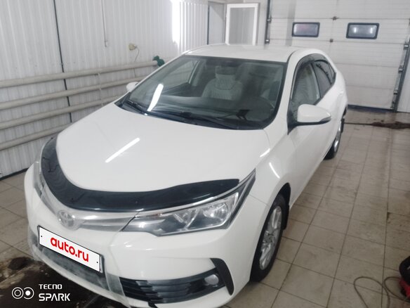 2016 Toyota Corolla XI (E160, E170, E180) Рестайлинг 1, белый, 1799000 рублей