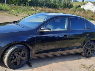 2015 Volkswagen Jetta VI Рестайлинг, чёрный, 900000 рублей, вид 4