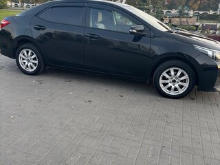 2015 Toyota Corolla XI (E160, E170, E180), чёрный, 1230000 рублей, вид 2
